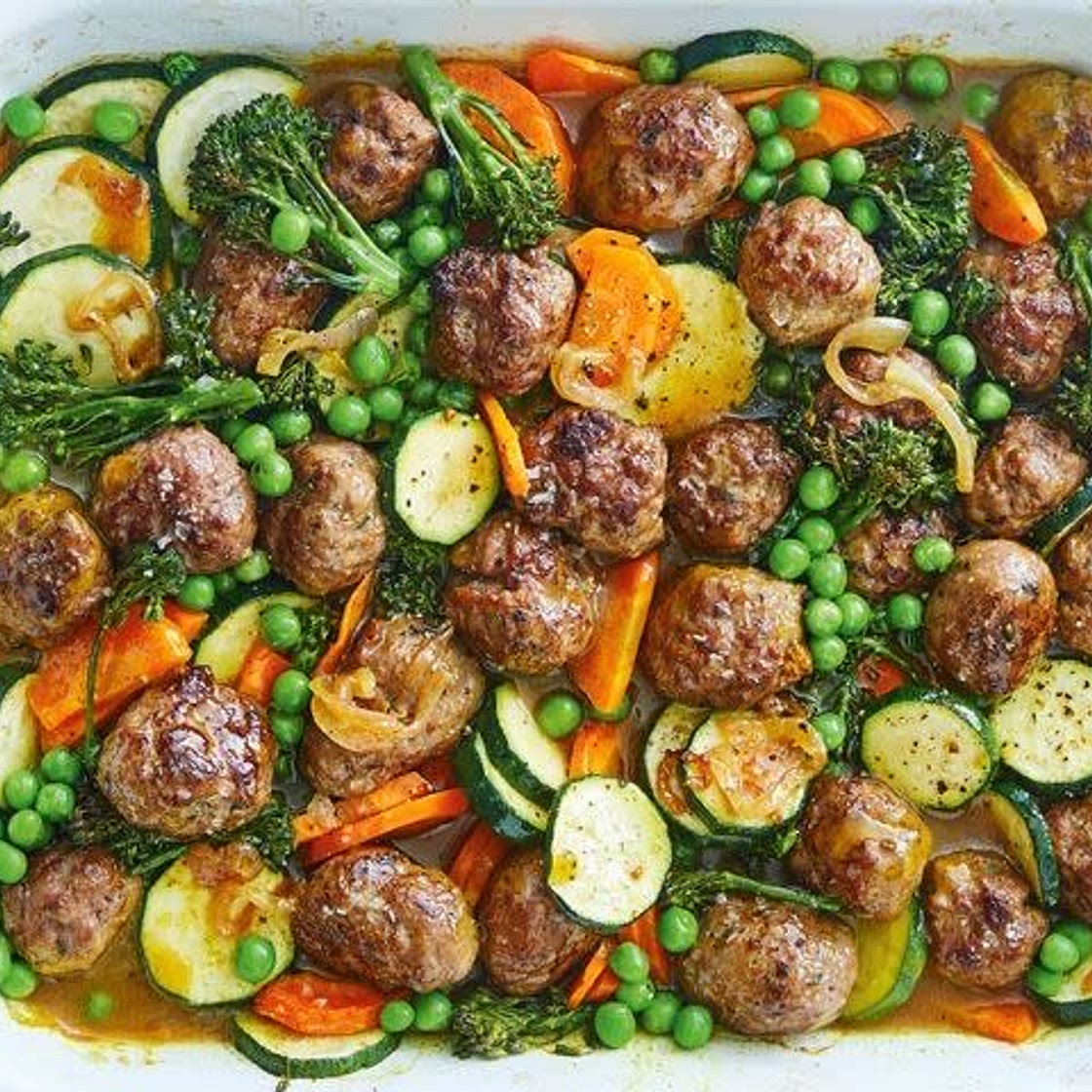Curried sausage meatball tray bake