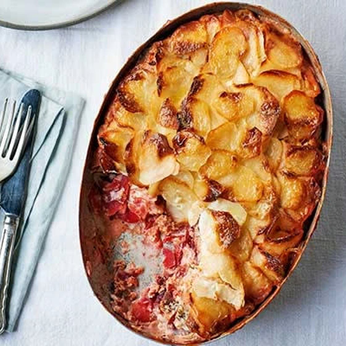 Gratin of fresh & smoked salmon, beetroot, potatoes & dill