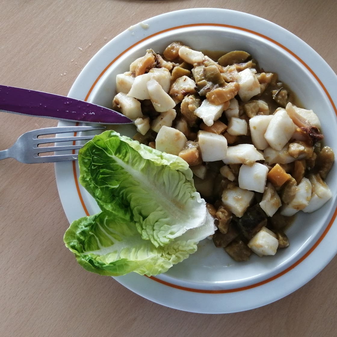 Fricassé de calamars aillés sur courgettes au lait de coco