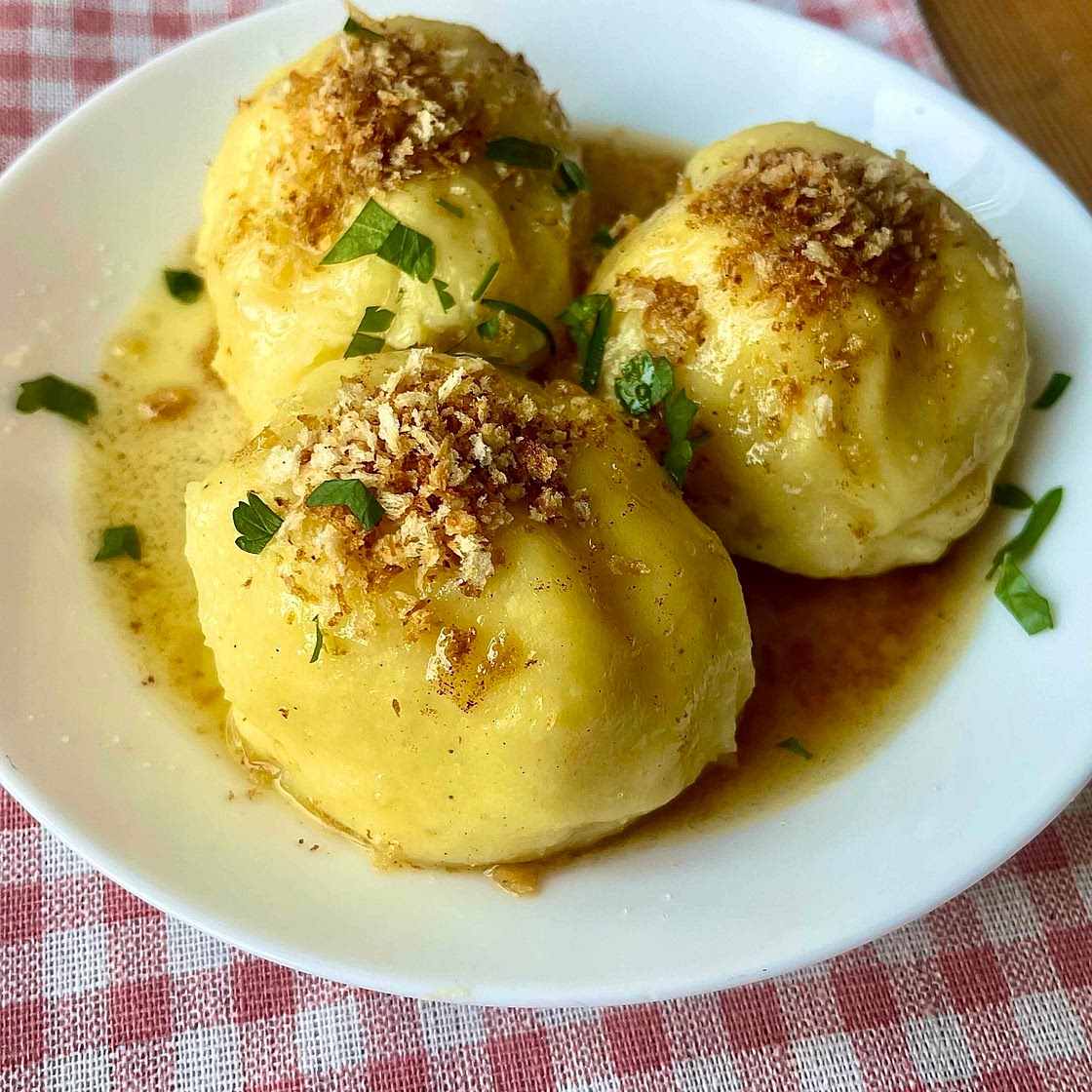 German Potato dumplings with herb butter 