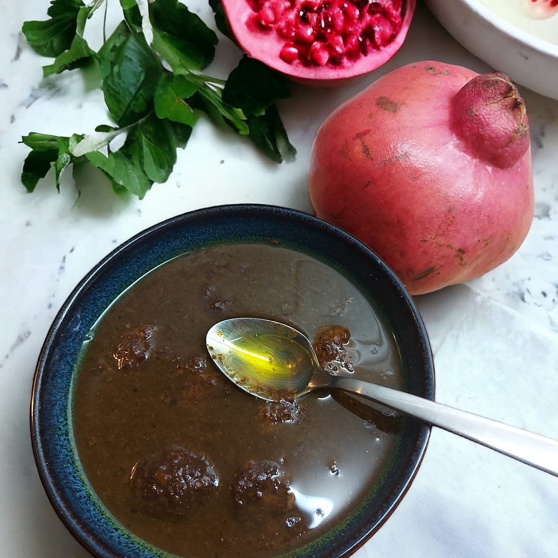 Khoresh-e Fesenjān (Persian walnut and pomegranate stew)