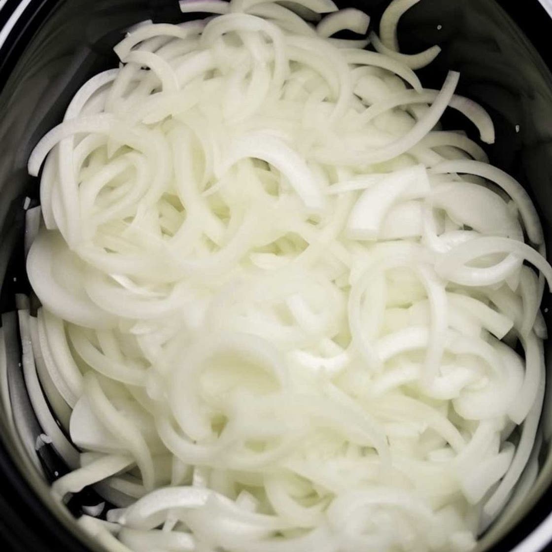Mom dumps 3 lbs of onions in slow cooker overnight, makes irresi
