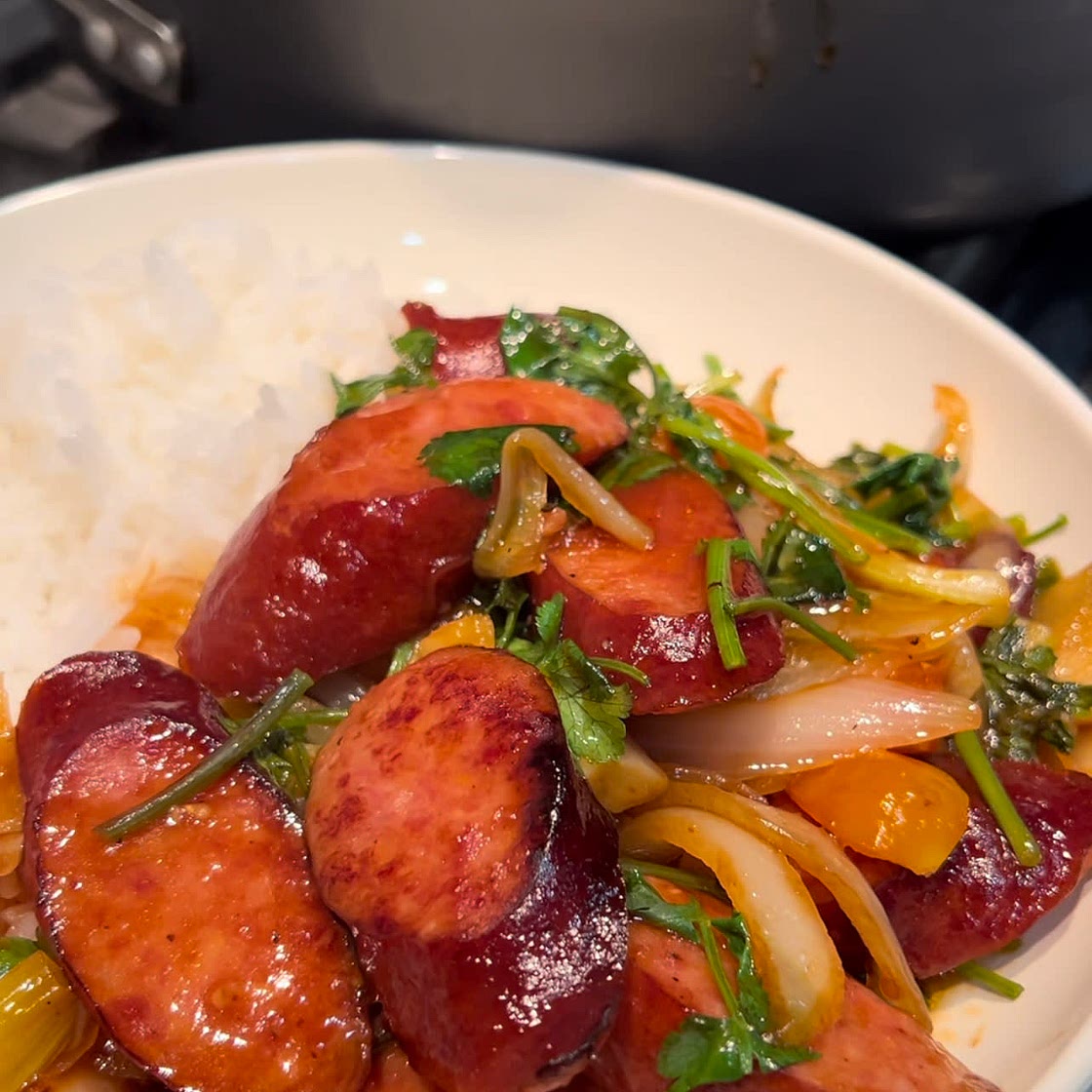 Stir fried kielbasa with steamed rice