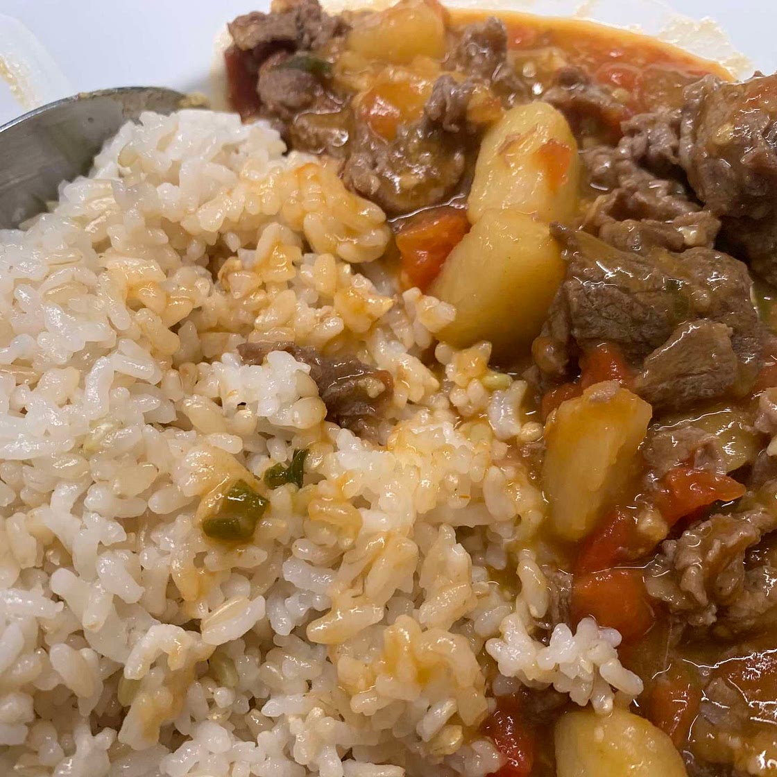 Shaved beef rice with tomato and potato