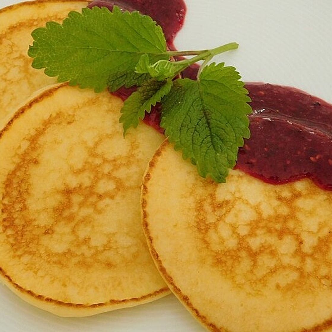 Quarkkäulchen mit Erdbeersauce
