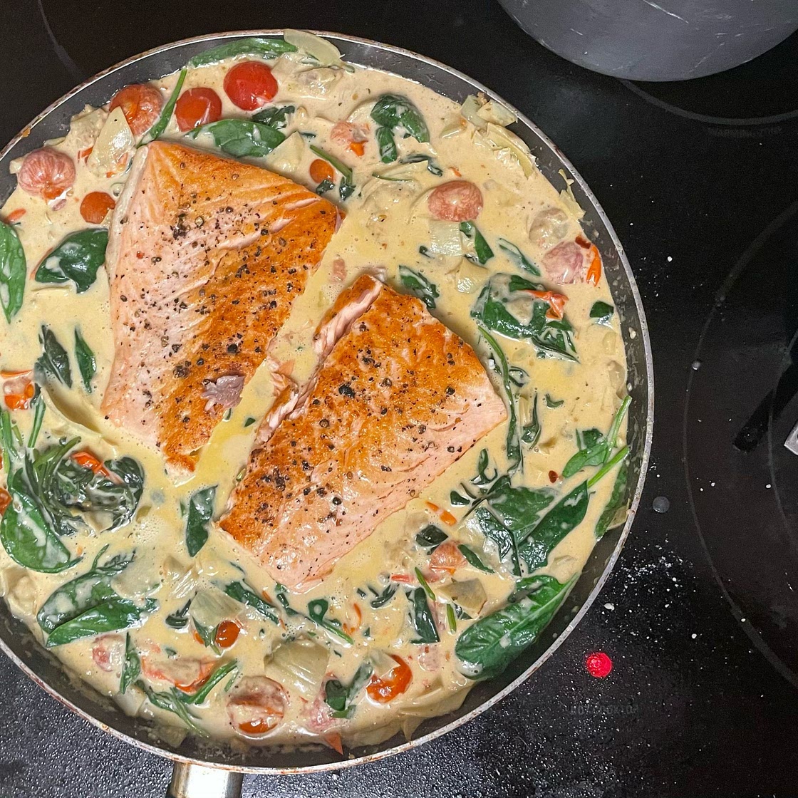 One-Pan Spinach and Artichoke Salmon with Tomatoes