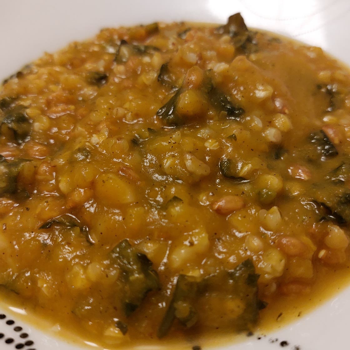Pumpkin soup, black cabbage and chestnuts