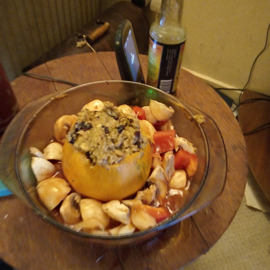 Stuffed pumpkin with veg in tomato sauce