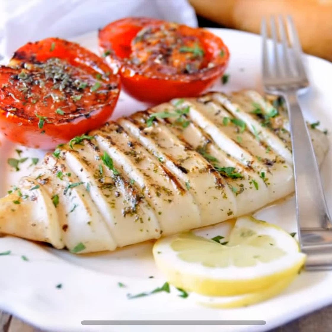 Pan-fried squid with Mediterranean tomato salad