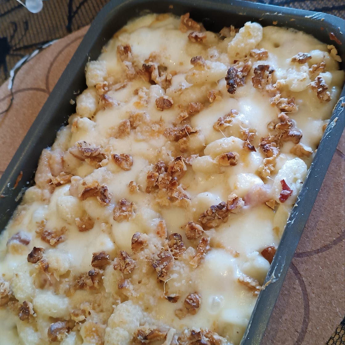 Gnocchi al forno con Gorgonzola, pancetta, noci e provola