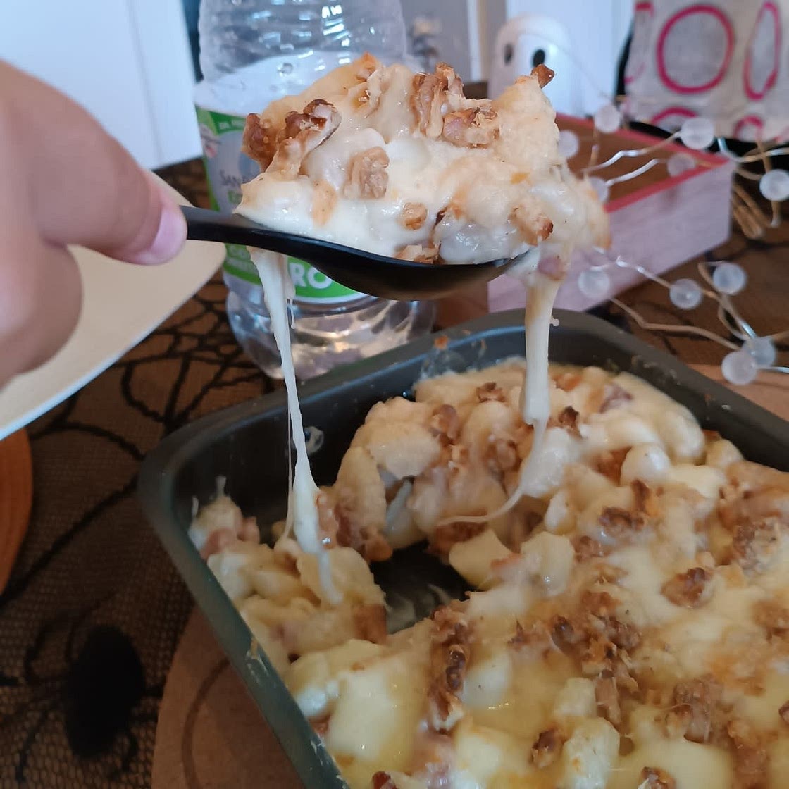 Gnocchi al forno con Gorgonzola, pancetta, noci e provola