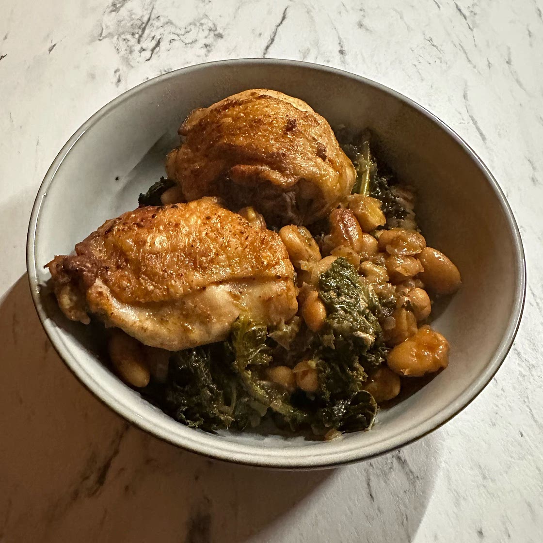 One-Pot Braised Chicken with Kale and White Beans