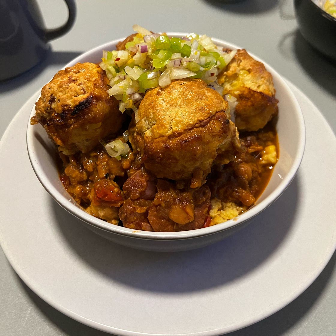 Brazilian pork stew with corn dumplings