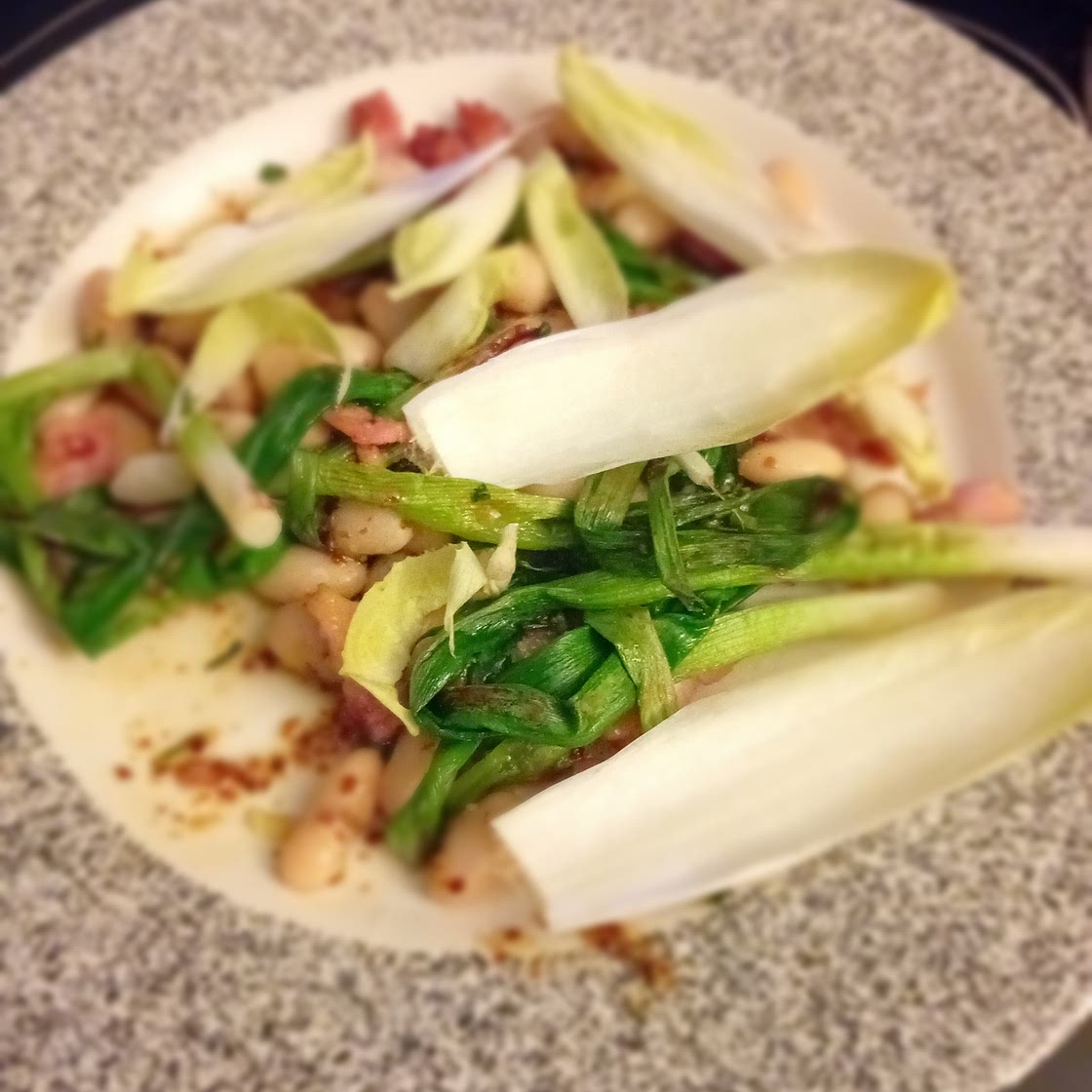 Blistered Salad Onions With White Beans And Lardons