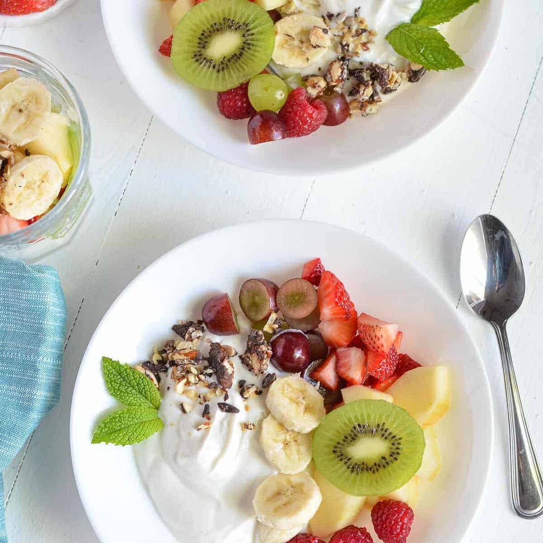 Fruit salad topped with Greek yogurt