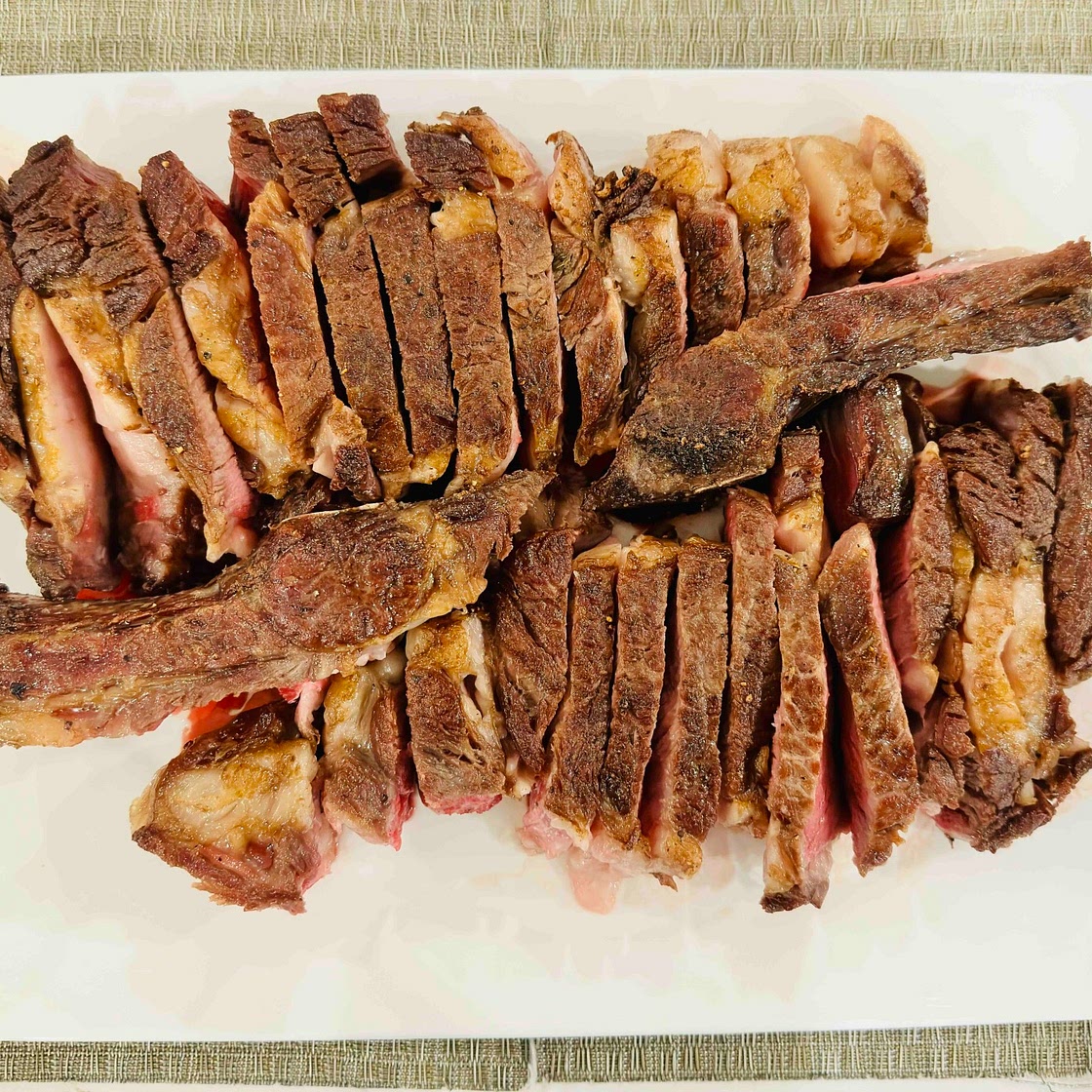 Sous-vide bone in ribeye steak 