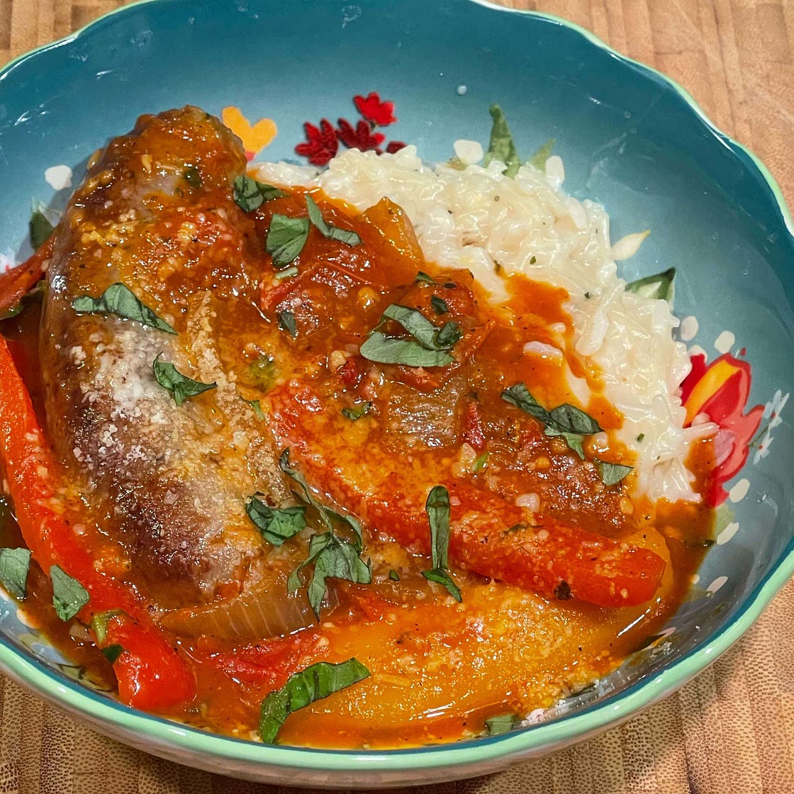 Sausage-and-Pepper Ragu Over Polenta