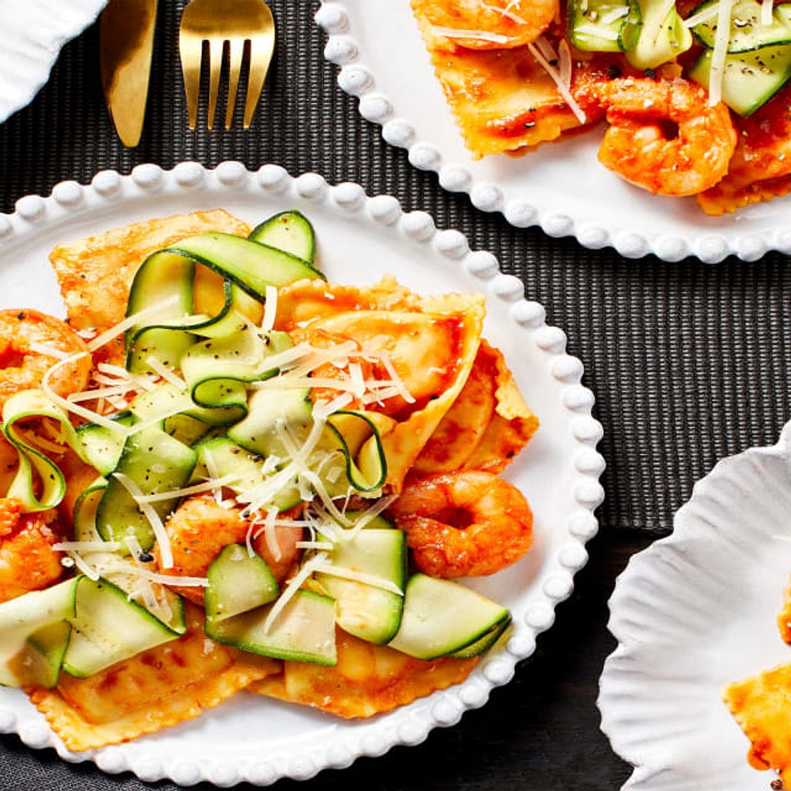 Shrimp with Lobster Ravioli in a Creamy Tomato Sauce with Zucchini Ribbons