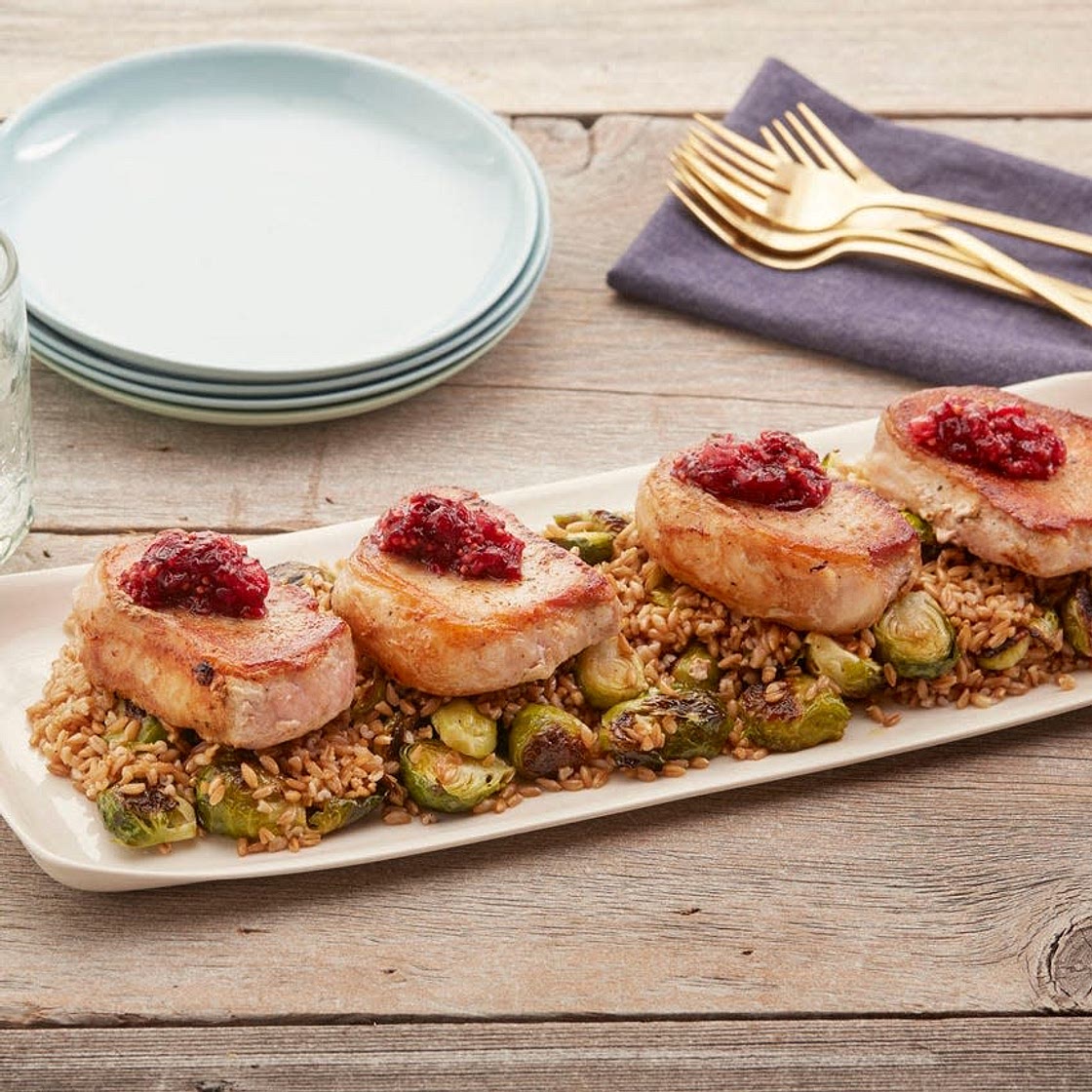 Seared Pork Chops with Farro, Brussels Sprouts & Cranberry Chutney