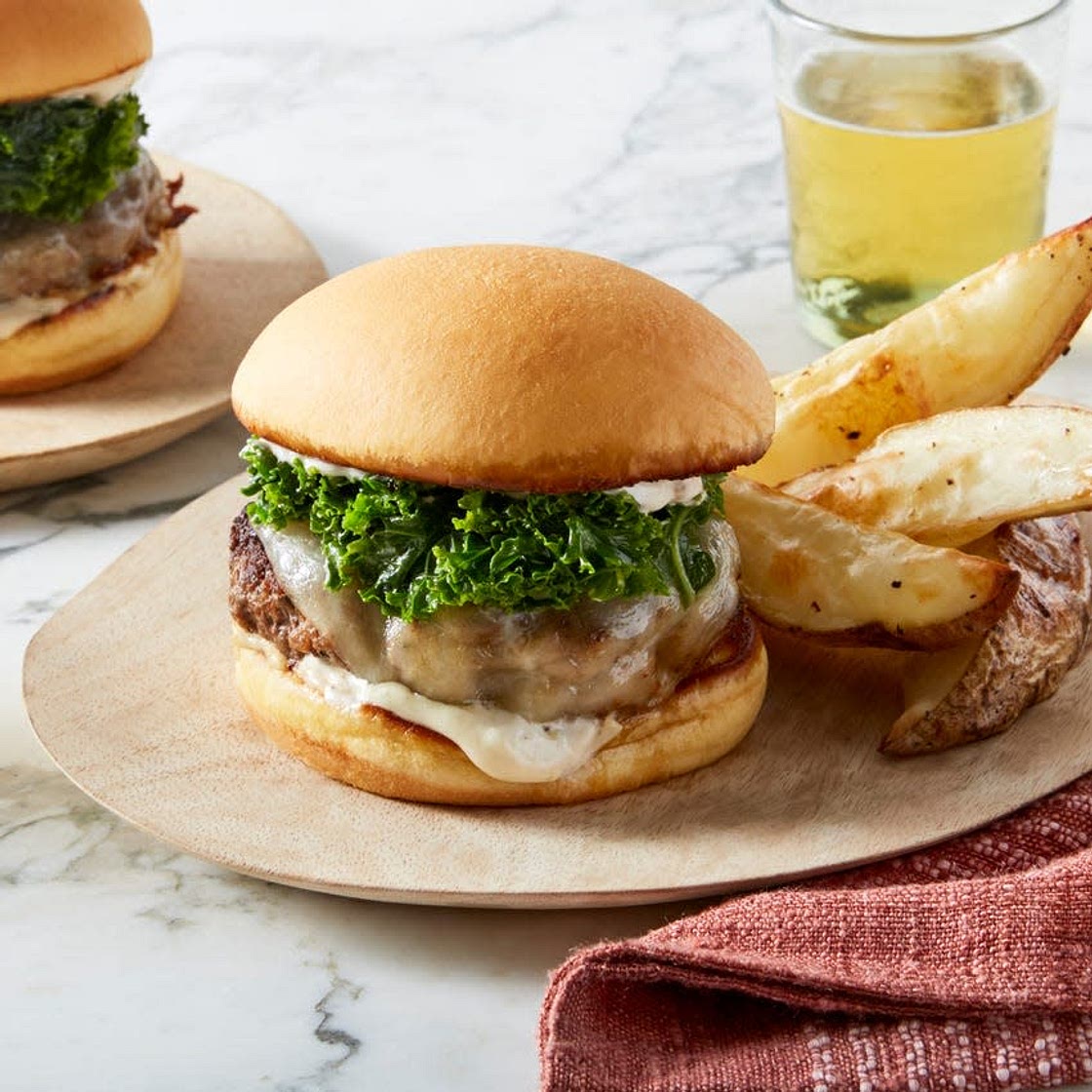 Provolone Cheeseburgers & Marinated Kale with Rosemary Roasted Potatoes