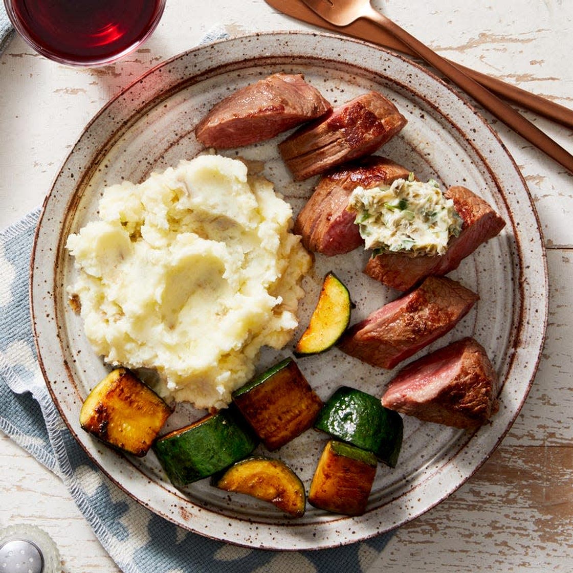 Seared Steaks & Parsley-Caper Butter with Creamy Mashed Potatoes & Zucchini