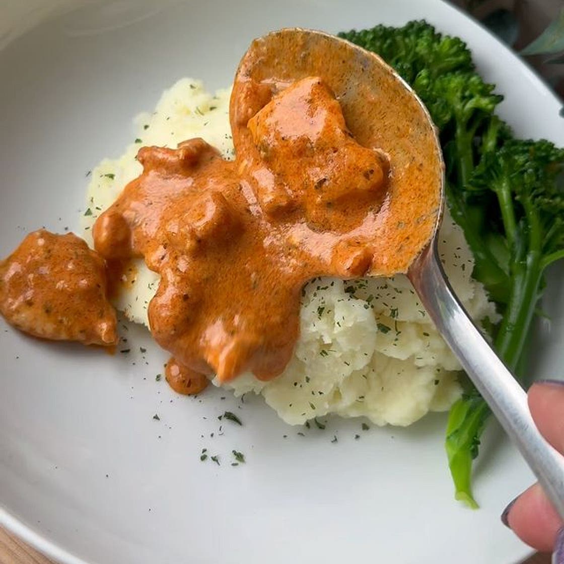 Chicken and bacon in a creamy red pesto sauce