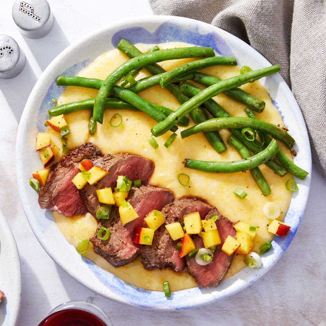 MasterChef Seared Steaks over Goat Cheese Polenta with Jalapeño-Peach Salsa