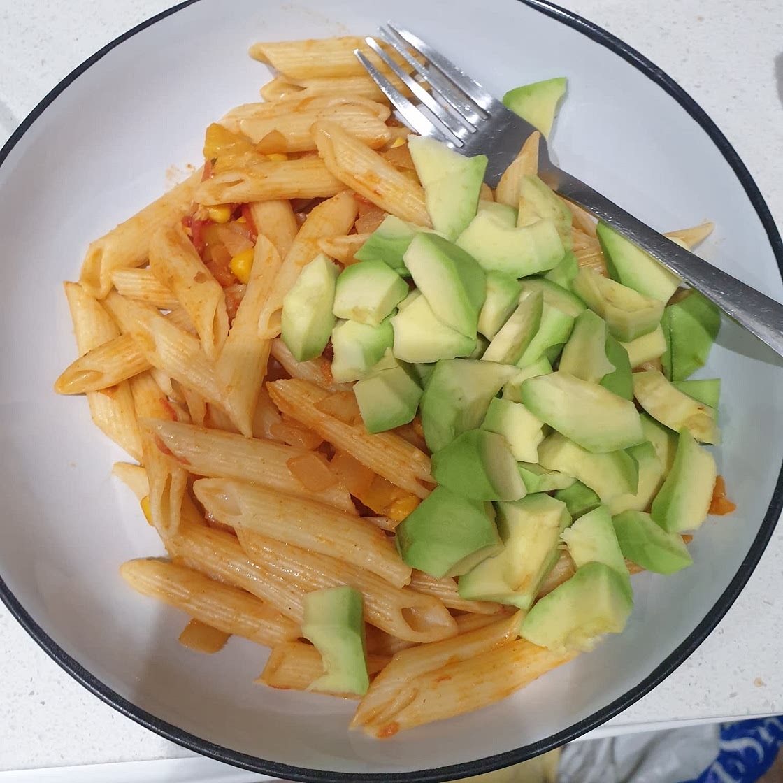 Tomato penne with avocado