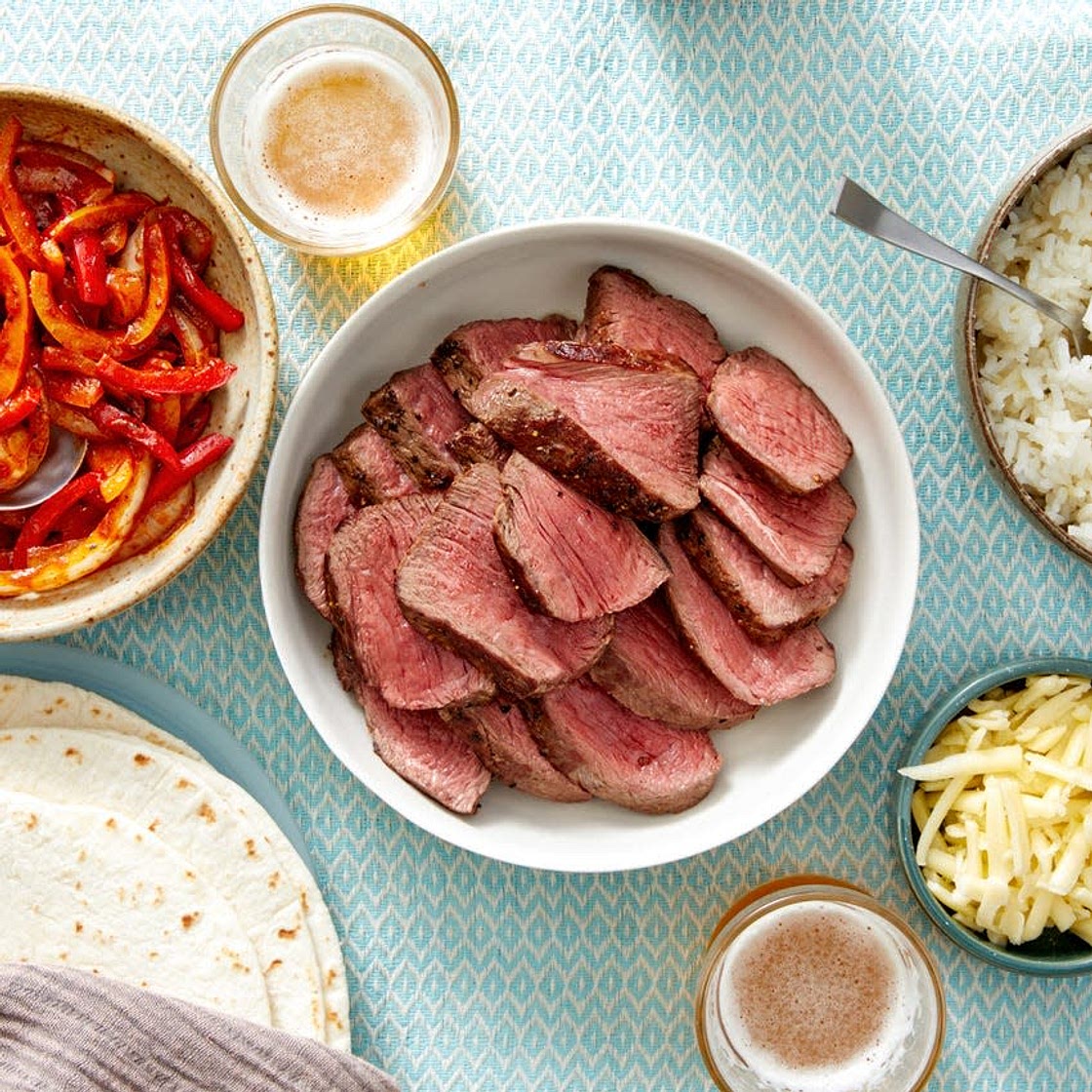 Fiesta Steak Fajitas with Onion, Peppers, & Cheesy Rice