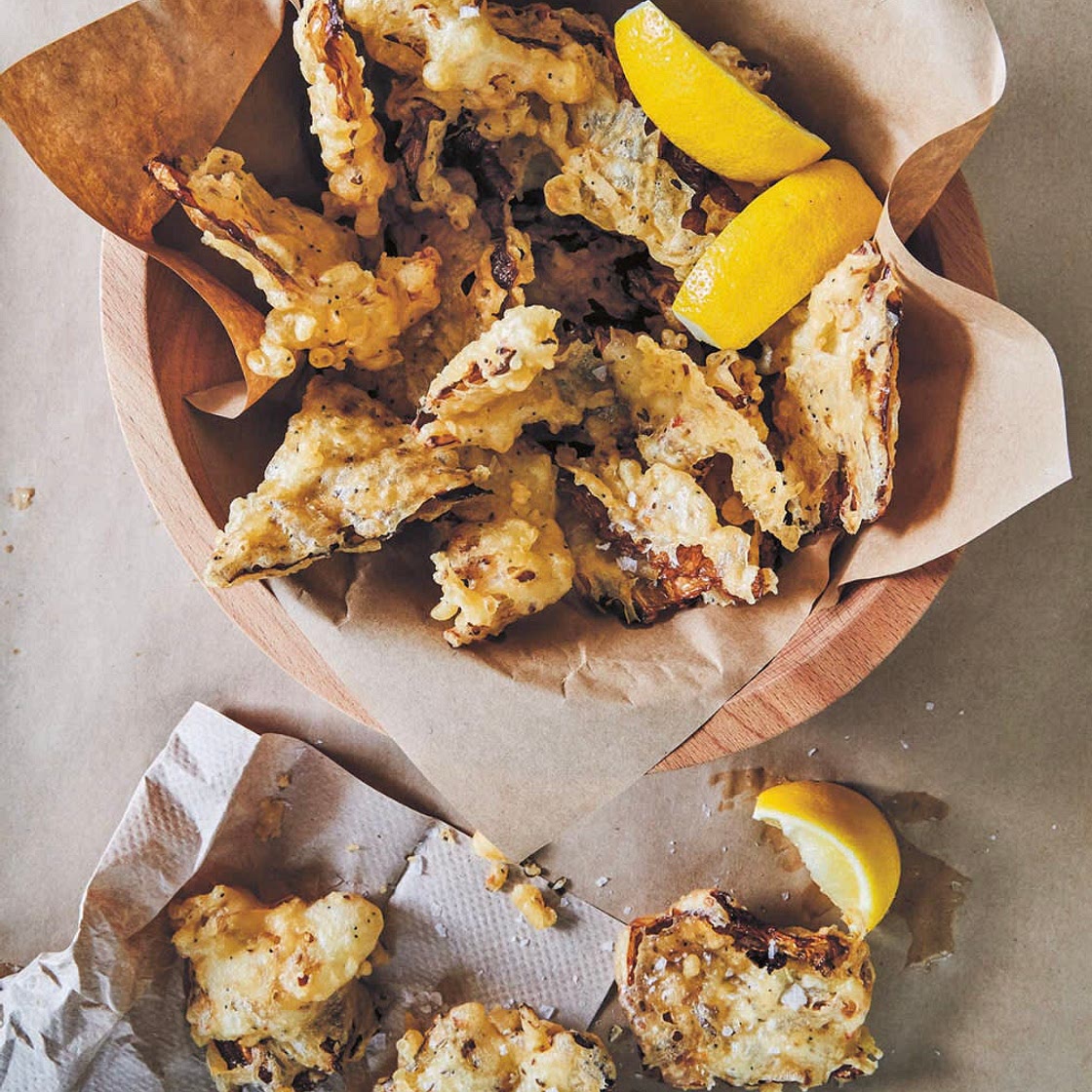 Battered and Fried Cabbage with Crispy Seeds and Lemon