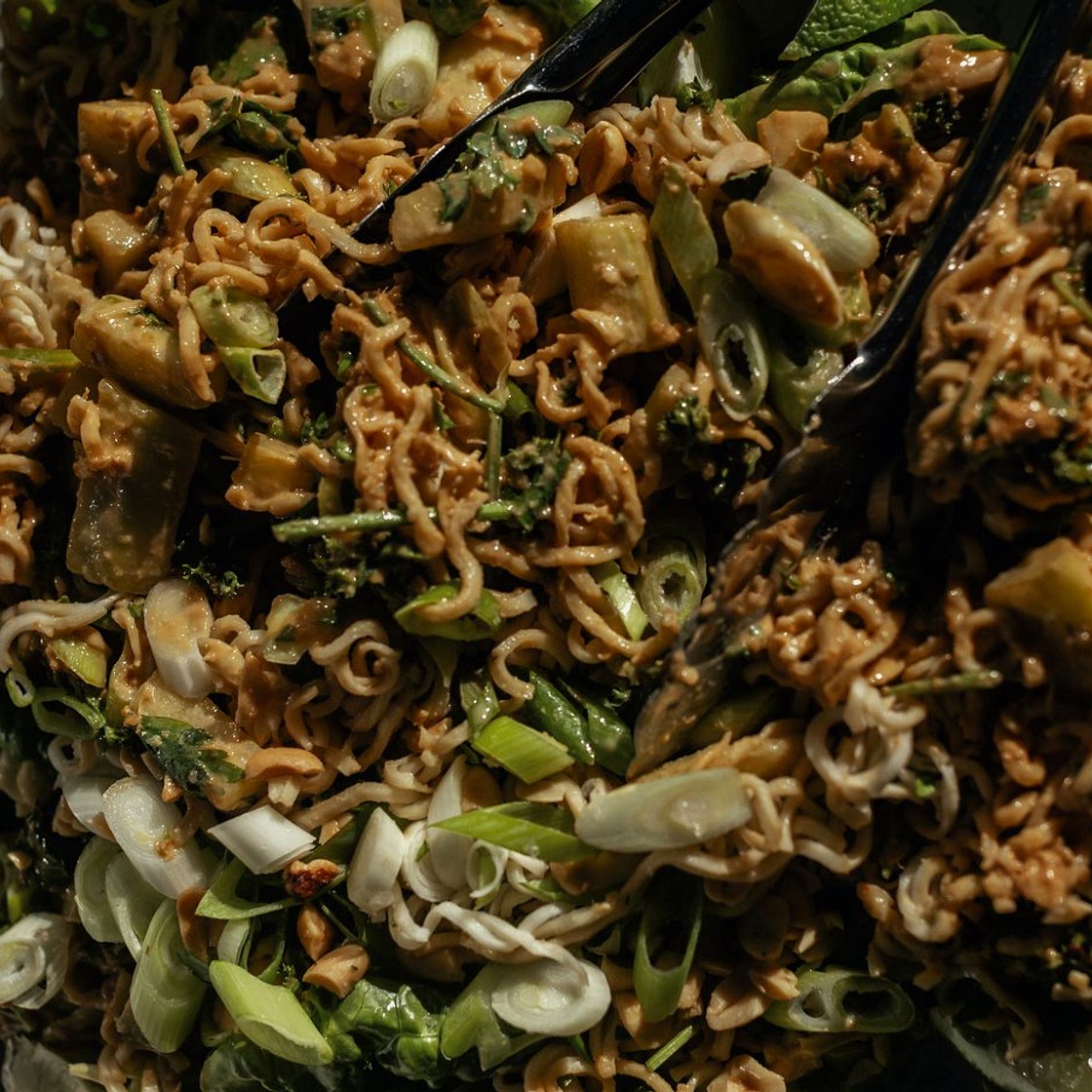 Fresh noodle salad with spicy peanut sauce