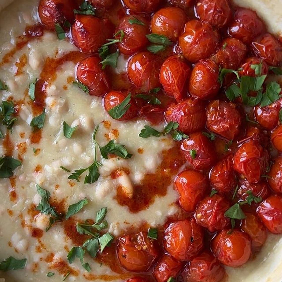 Harissa roasted cherry tomatoes, juicy and bursting with flavour