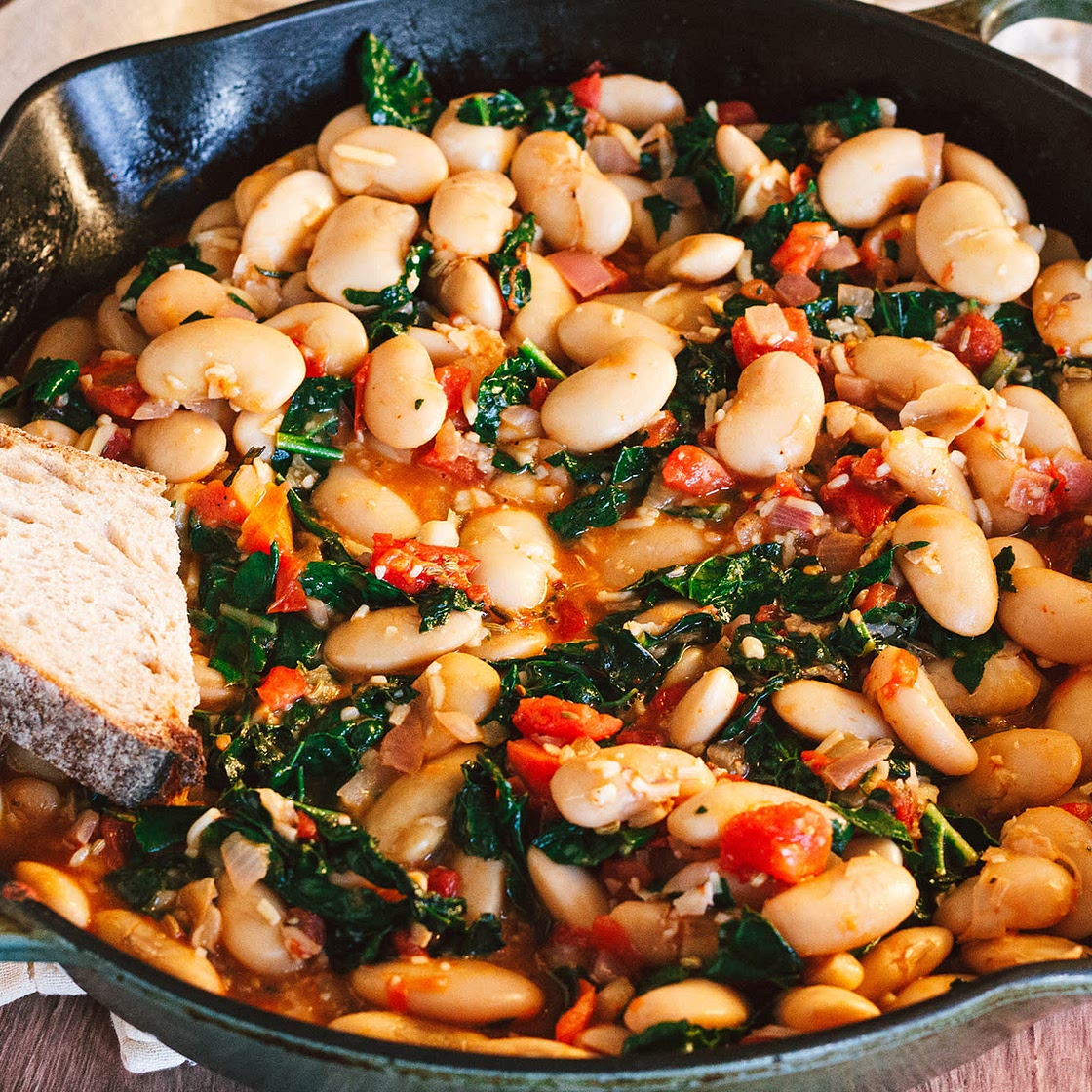 Saucy White Beans with Tomatoes, Greens, and Garlic