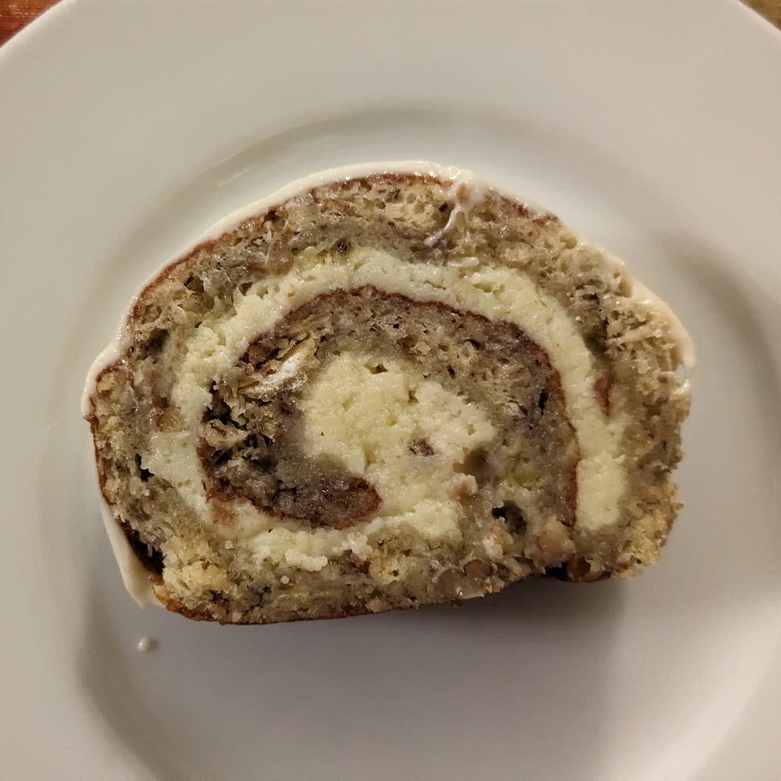 Banana Cream Cheese Cake Roll with Pecans Cranberries and Ginger