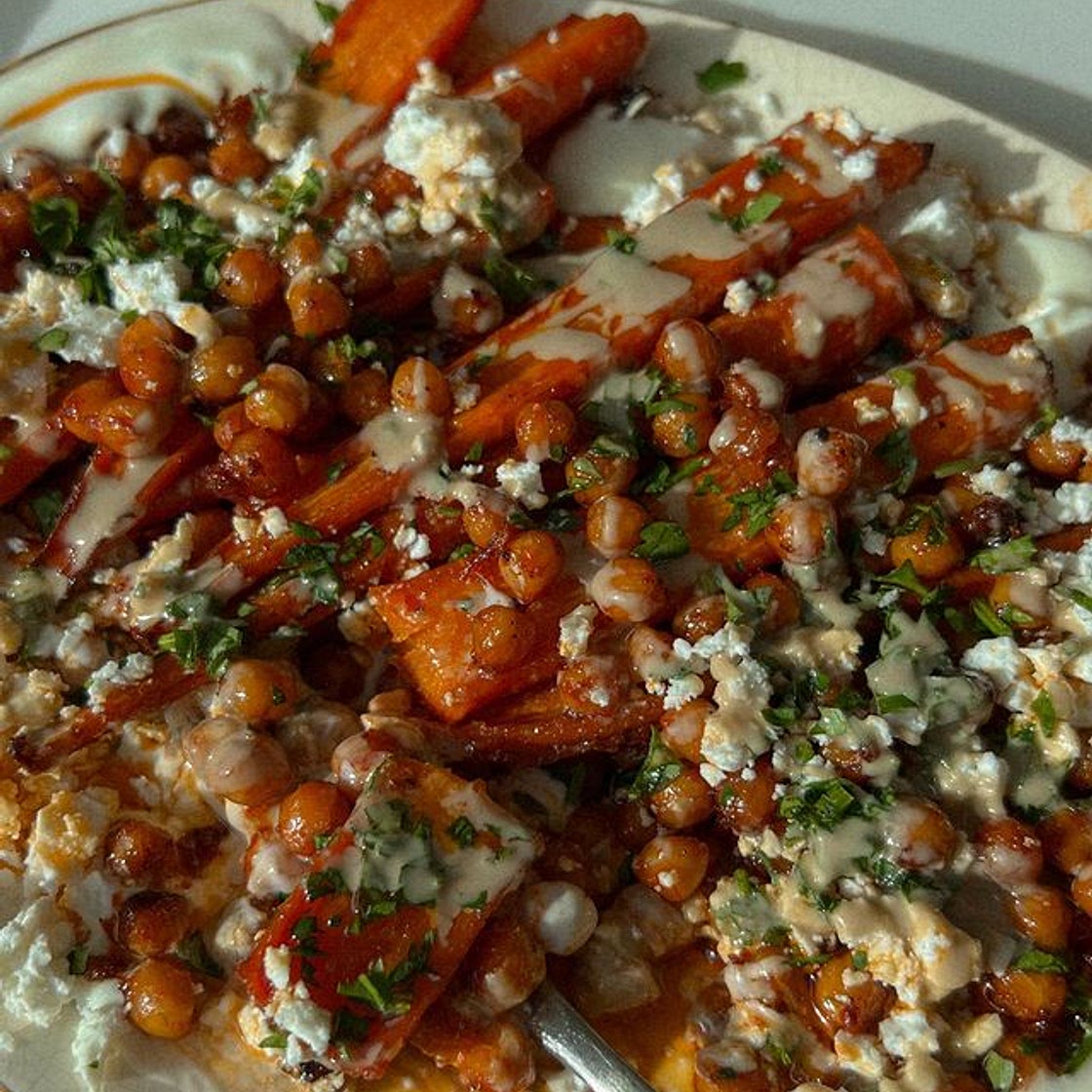 Harissa roasted carrots + chickpeas served with creamy yogurt, f