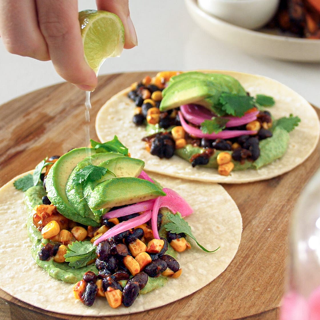 Tangy Black Bean Tacos with Avocado Cream