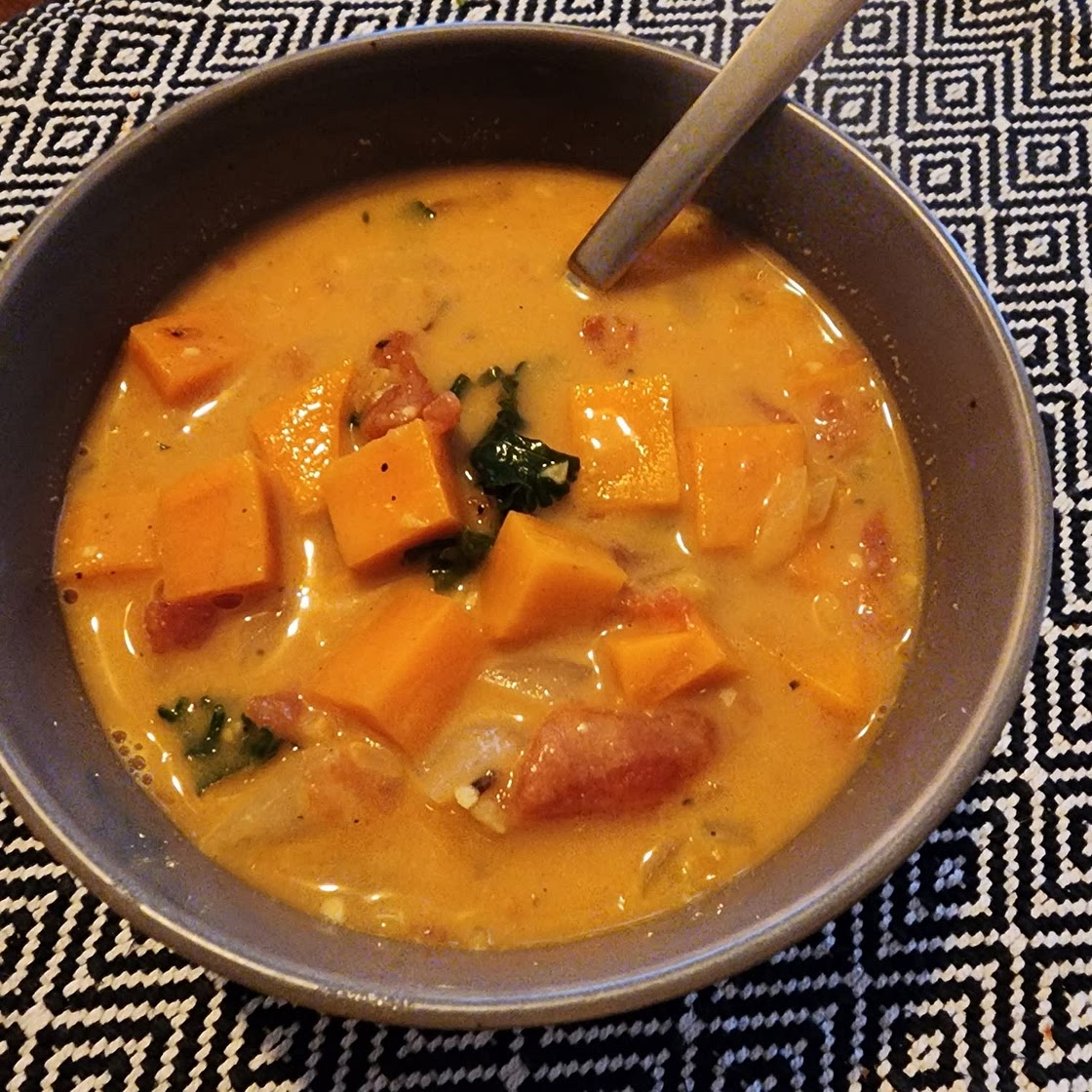 Spicy Peanut Soup with Sweet Potato + Kale