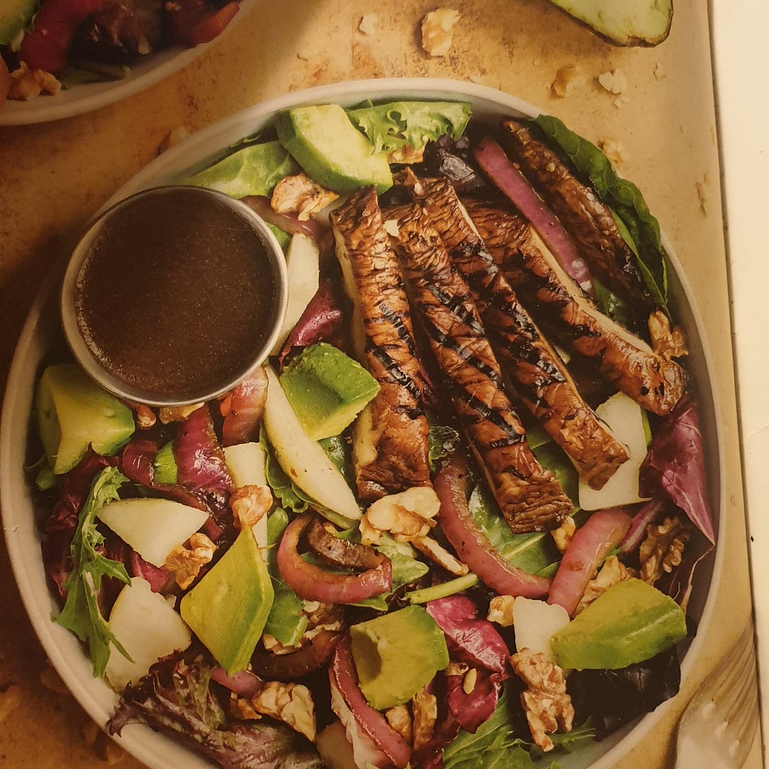 Vegan Walnut, avo and pear salad with marinated Portobello caps and red onion