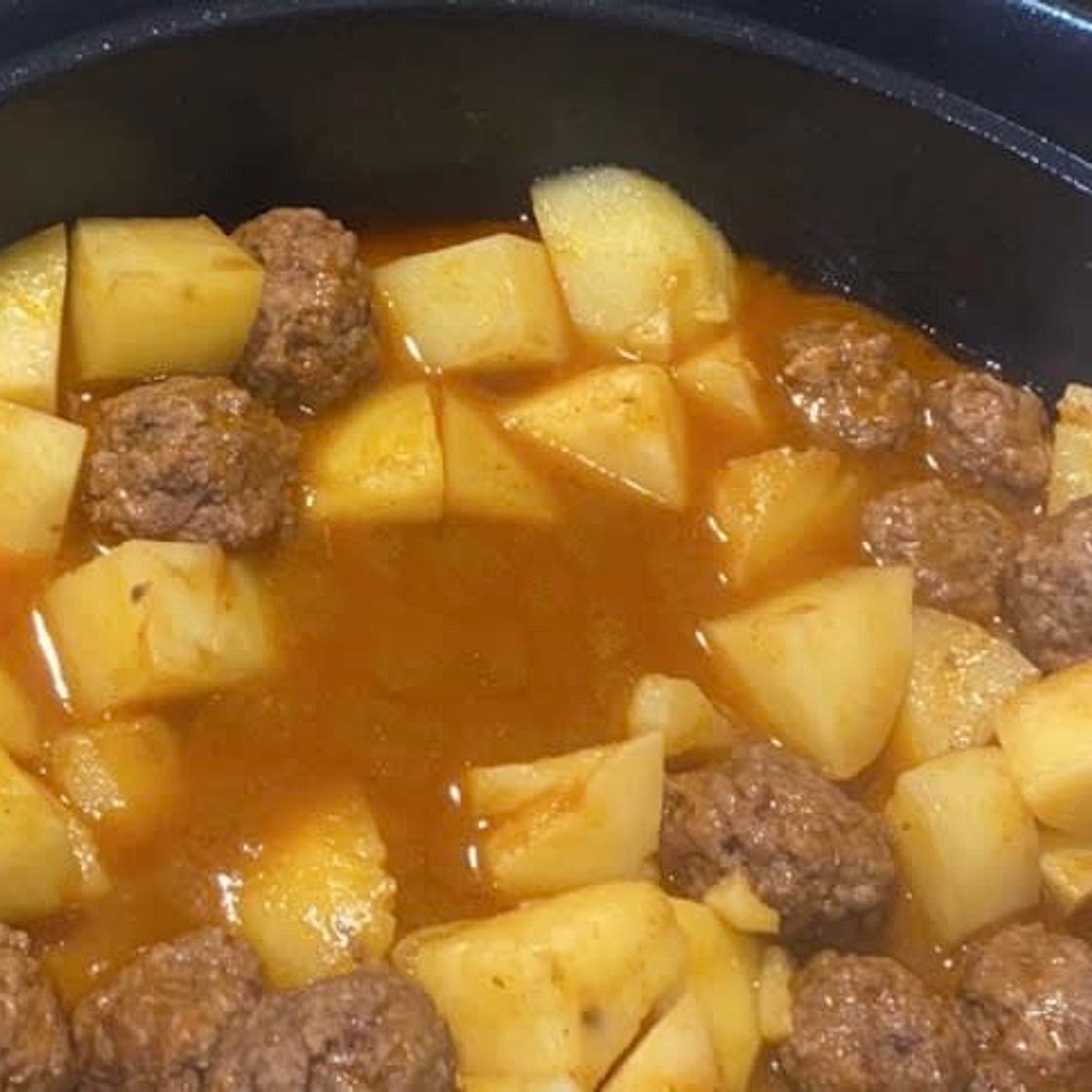 Ground Beef and potatoes in tomato paste sauce 