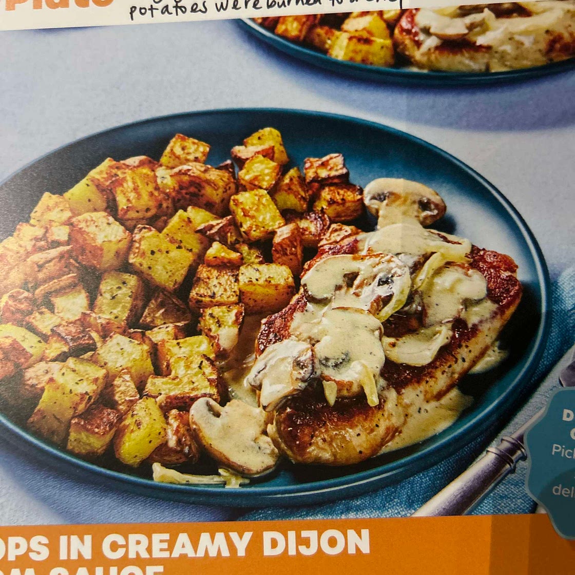 Pork chops in creamy Dijon mushroom sauce