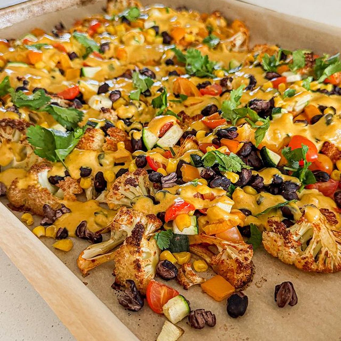 CAULIFLOWER VEGGIE PACKED NACHOS WITH A HOMEMADE VEGAN CHEESE SAUCE