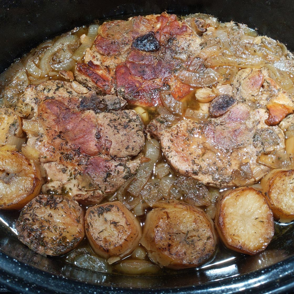 Braised Pork Chops and Fondant Potatoes with Onions in Sauce