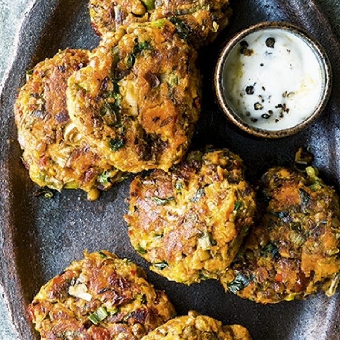 Israeli sweet potato and lentil fritters with garlic yoghurt sauce