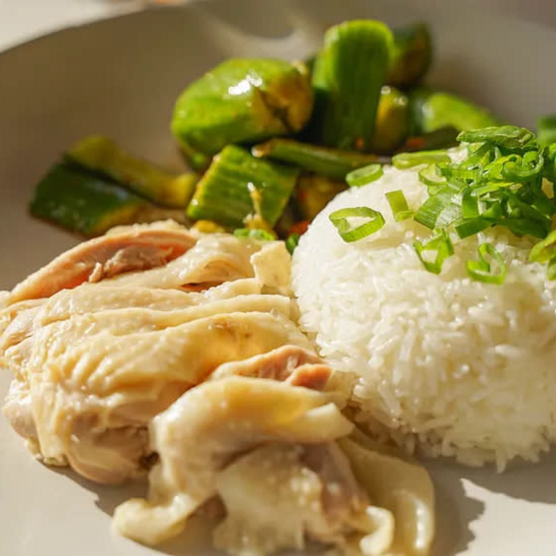 Poached Chicken and Rice with Soy and Vinegar Green Onion Sauce