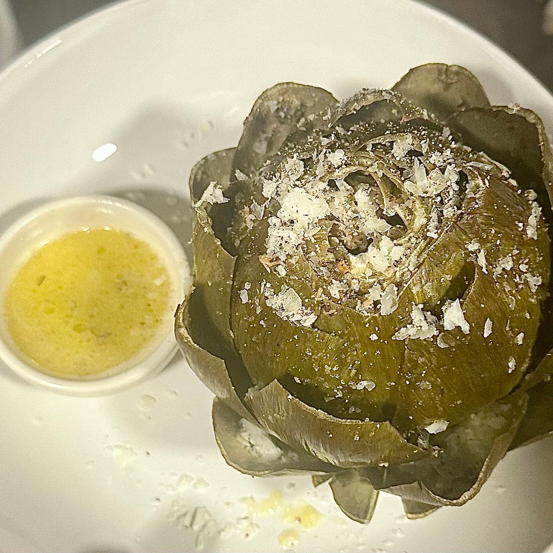Herby Steamed Artichoke with Lemon Caper Butter