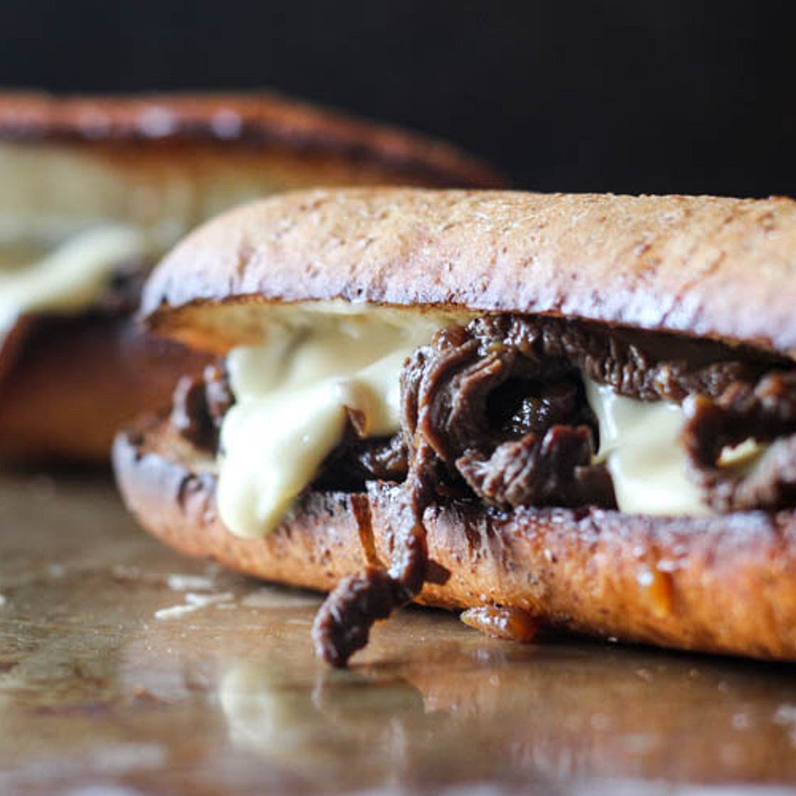 Caramelized Onion and Steak Sandwiches with White Cheddar Sauce