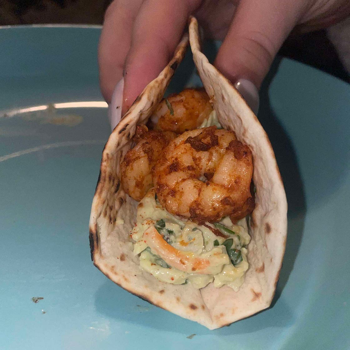 Shrimp tacos with a creamy avocado slaw