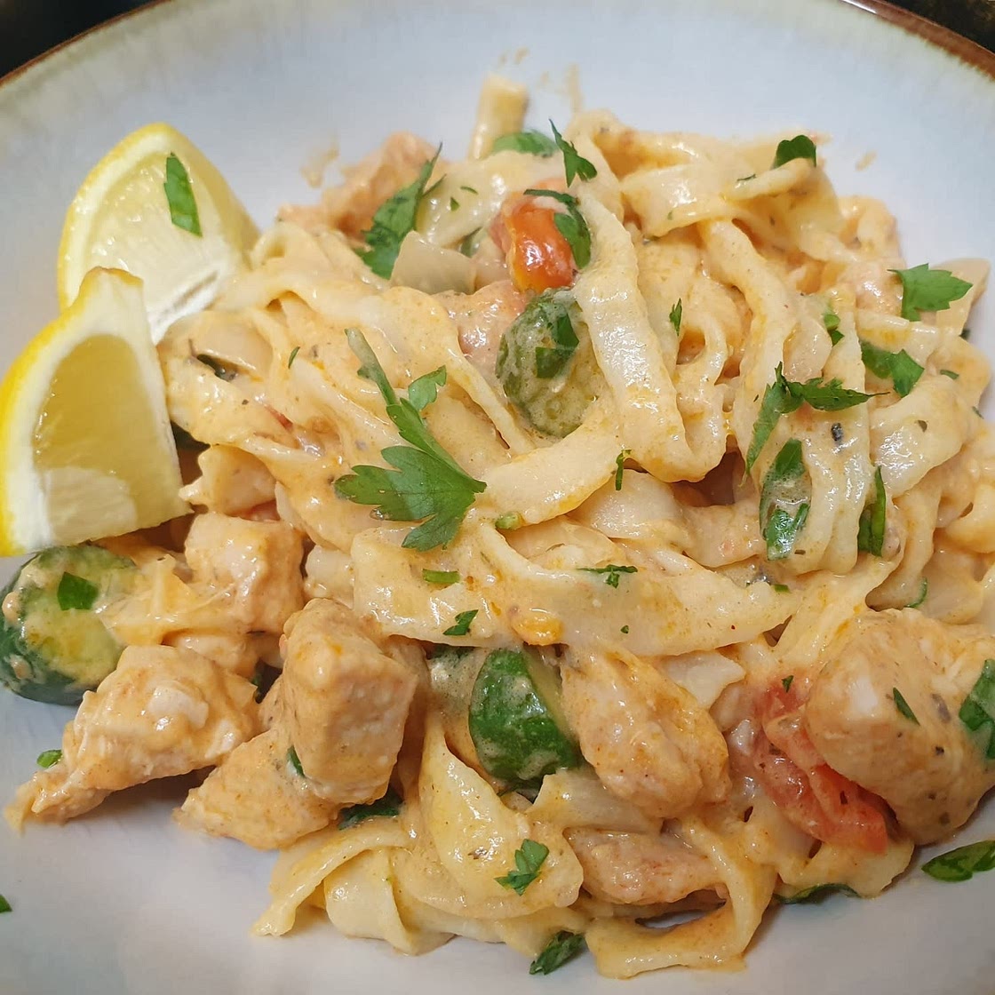 Creamy Shrimp Tagliatelle with Heirloom Tomatoes, Garlic, and Chili