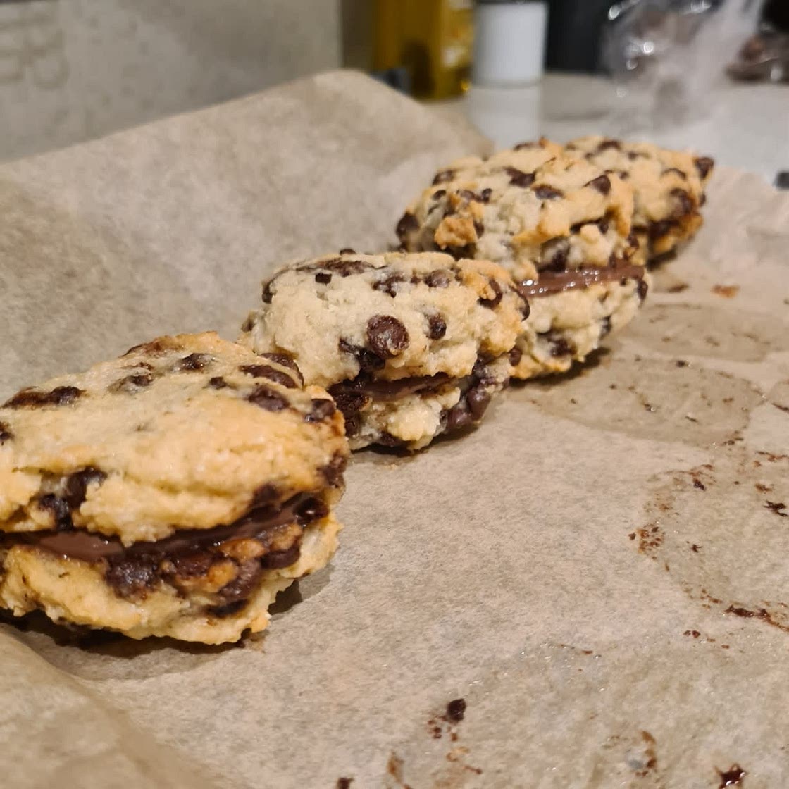 NUTELLA STUFFED CHOCOLATE CHIP COOKIE SANDWICHES