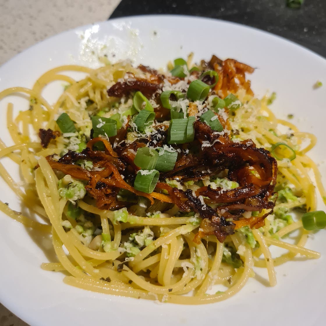 Pea pesto spaghetti on carrot noodles